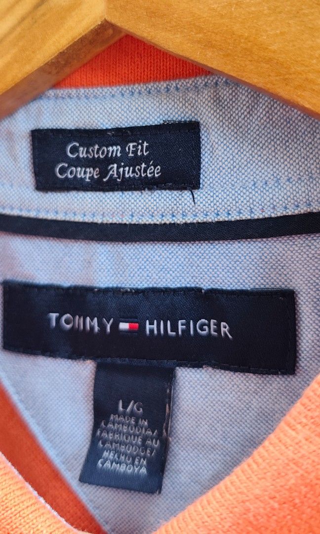 Orange Poloshirt TommyHilfiger large (Category: Activewear) located in Villasis. Submitted by znivvthrift (Listing ID 1465445997, Image 3). Description: Slightly used.