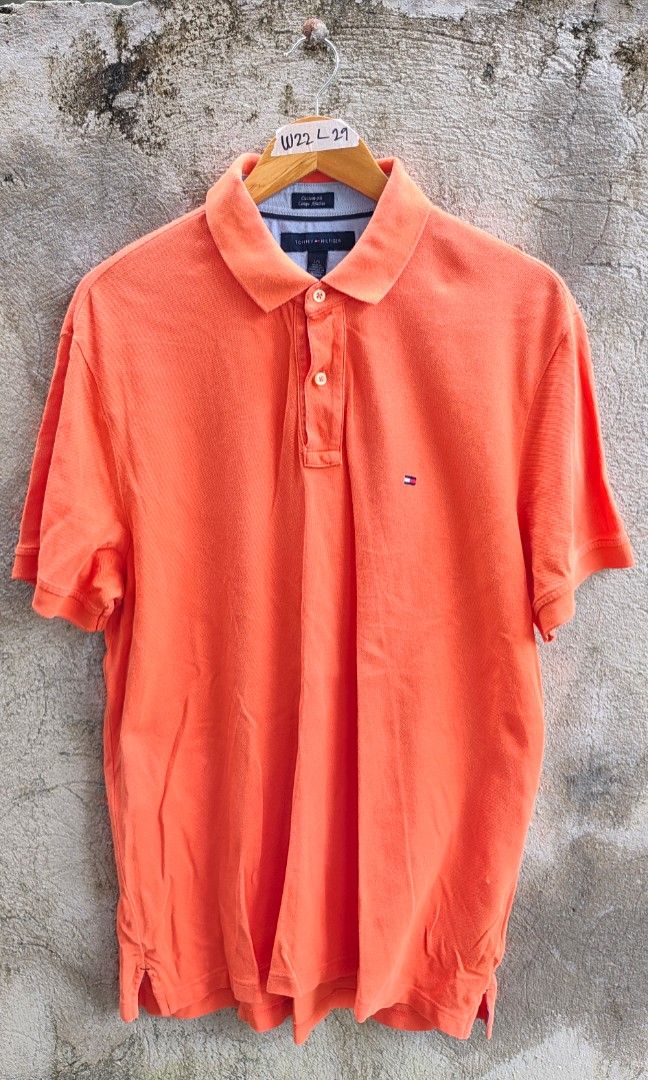 Orange Poloshirt TommyHilfiger large (Category: Activewear) located in Villasis. Submitted by znivvthrift (Listing ID 1465445997, Image 1). Description: Slightly used.