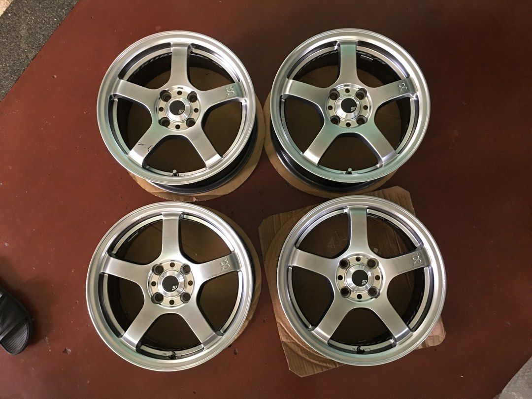 Orig Rays Gramlights T57-RC (Category: Mags and Tires) located in Quezon City. Submitted by aremcy29 (Listing ID 1465398422, Image 1). Description: Orig Rays Gramlights T57 - RC) 15x6.5 +43 4x100 With center caps Issue: Lip gutter marks and some spoke scratches With pantayo tires (expired) RFS: Decluttering, extra set 40k (negotiable).