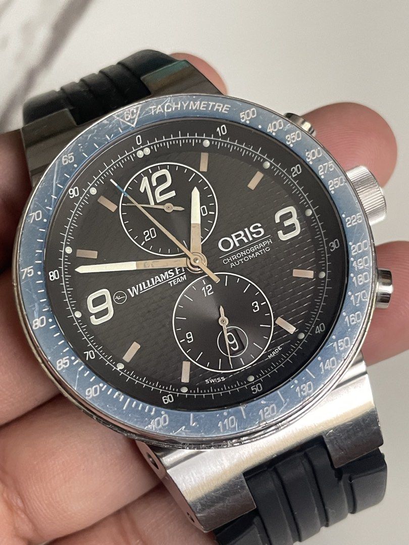 Oris Williams F1 Team Chronograph (Category: Luxury Watches) located in Taguig. Submitted by j_watches007 (Listing ID 1465385806, Image 3). Description: Secondhand Used Watch Vintage Oris Williams F1 Chronograph 2000’s Swiss Made Automatic Dial: Black textured dial with sub-dials and date window at the bottom Sapphire Crystal Stainless Steel Front Case & Back 45mm Oris Durable Rubber & Buckle “Watch Only” DISCLAIMER: IT’S OLD USED WATCHES EXPECT 