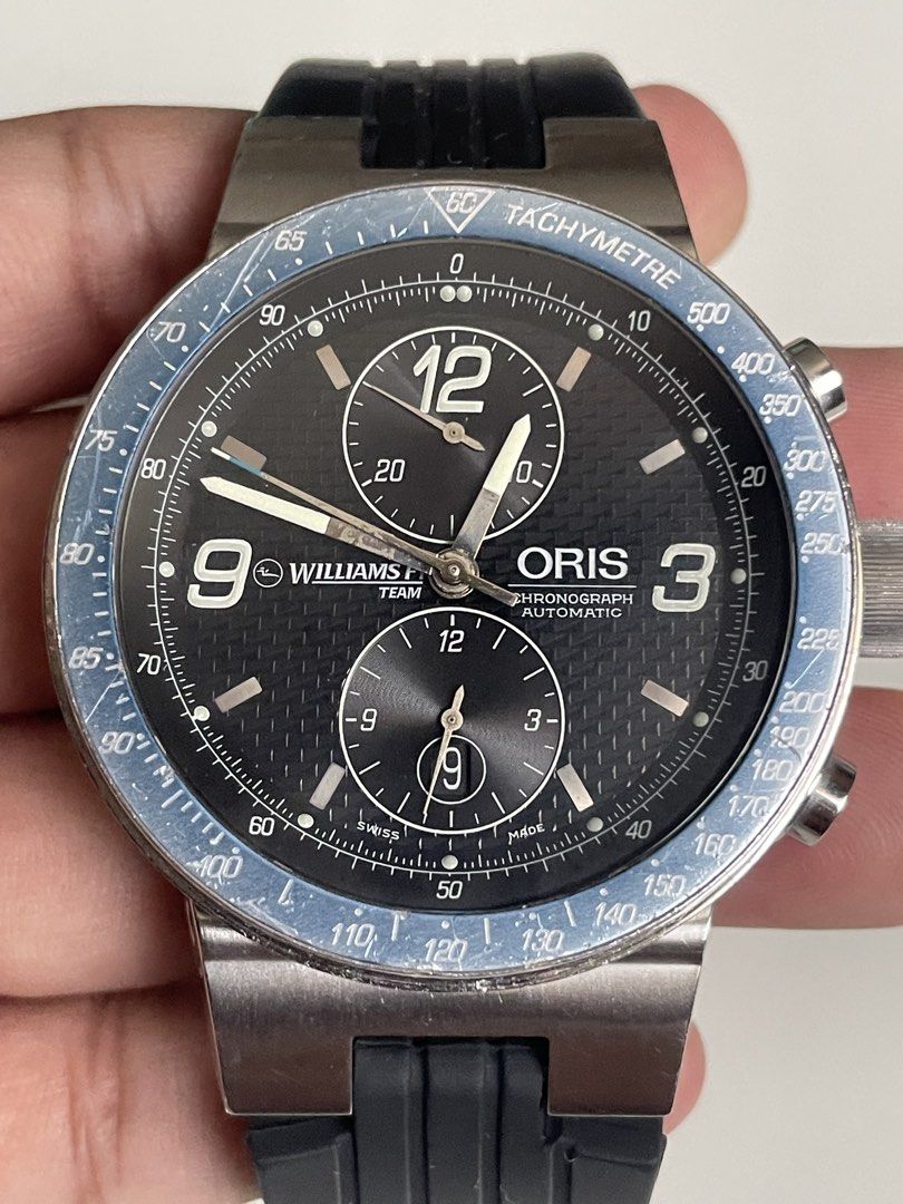 Oris Williams F1 Team Chronograph (Category: Luxury Watches) located in Taguig. Submitted by j_watches007 (Listing ID 1465385806, Image 2). Description: Secondhand Used Watch Vintage Oris Williams F1 Chronograph 2000’s Swiss Made Automatic Dial: Black textured dial with sub-dials and date window at the bottom Sapphire Crystal Stainless Steel Front Case & Back 45mm Oris Durable Rubber & Buckle “Watch Only” DISCLAIMER: IT’S OLD USED WATCHES EXPECT 