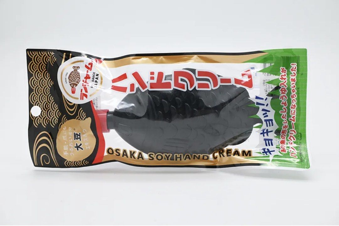 Osaka Soy Hand Cream Fish Shape (Category: Hands & Nails) located in Pasig City. Submitted by nakamuraka (Listing ID 1465398610, Image 2). Description: - Unique design: Shaped like the classic Japanese soy sauce fish container in black with a red cap - Nourishing formula: Infused with soybean extract to deeply moisturize hands and nails - Skin-friendly: Gentle, alcohol-free formula suitable for everyday use - Condition: Brand new, unopened, and s