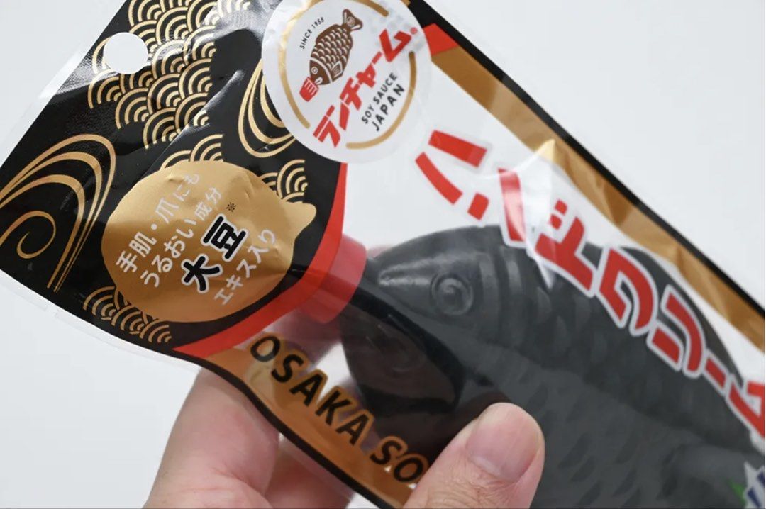 Osaka Soy Hand Cream Fish Shape (Category: Hands & Nails) located in Pasig City. Submitted by nakamuraka (Listing ID 1465398610, Image 3). Description: - Unique design: Shaped like the classic Japanese soy sauce fish container in black with a red cap - Nourishing formula: Infused with soybean extract to deeply moisturize hands and nails - Skin-friendly: Gentle, alcohol-free formula suitable for everyday use - Condition: Brand new, unopened, and s