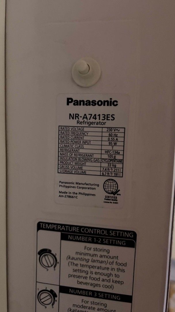 Panasonic NR-A7413ES Refrigerator (Category: Refrigerators and Freezers) located in Marikina City. Submitted by lenyyy (Listing ID 1465529433, Image 2). Description: - Brand: Panasonic - Model: NR-A7413ES - Type: Single door refrigerator with top freezer compartment - Color: Gray finish adorned with fun travel magnets - Interior: Multiple wire shelves and convenient door storage pockets - Power: 230V, 60Hz standard home appliance - Condition: Wor