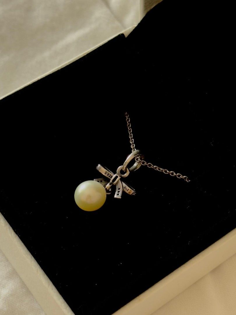 Pandora Bow Pearl Necklace (Category: Necklaces) located in Muntinlupa City. Submitted by aremvy (Listing ID 1465549680, Image 3). Description: - Includes original chain - Classic, versatile design perfect for daily wear.