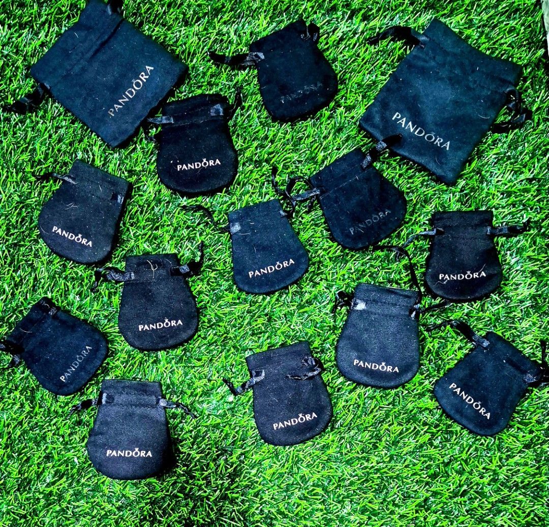Pandora Pouch 🩷 | Unused (Category: Purses & Pouches) located in Antipolo. Submitted by saribymonica (Listing ID 1465551806, Image 1). Description: Pandora Pouch 🩷 | Unused | Decluttering Unused but stored for a long time. Some pieces may have slight fading on the print due to storage. Small/Regular — ₱175 Larger Size — ₱250 Pouch only — no jewelry included. Please check all photos carefully for the actual condition and details. Priced fairly f