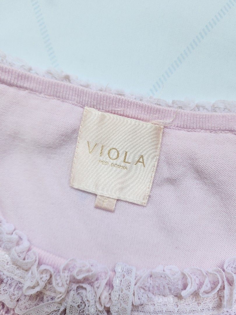 pastel pink knitted top (Category: Sleeveless) located in Batangas. Submitted by curatedbylisilaloop (Listing ID 1465431861, Image 2). Description: VIOLA PER DONNA | pastel pink knit lace trim front tie top | w/ minimal lace runs Size: freesize Bust: 34-38".