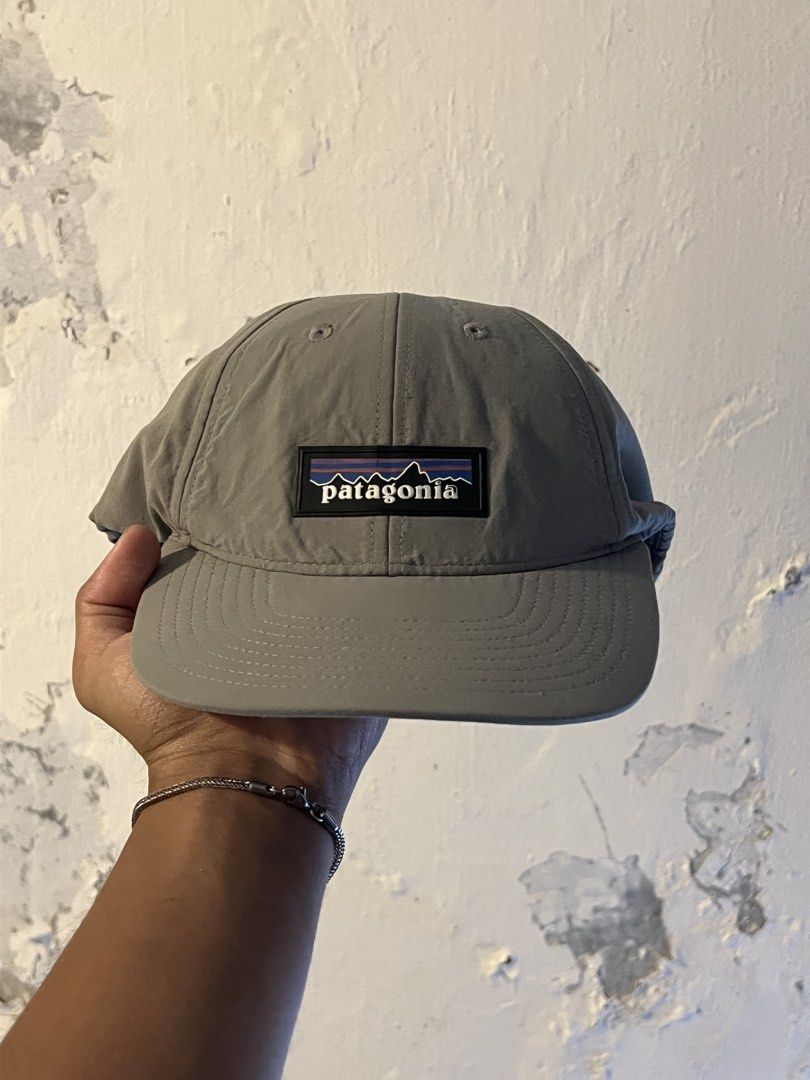 Patagonia Grey NetPlus Snapback Hat Cap (Category: Caps & Hats) located in Manila. Submitted by maccabeyo (Listing ID 1465412310, Image 1). Description: - Brand: Patagonia - Style: Classic P-6 logo patch snapback hat - Color: Grey - Material: 94% nylon, 6% elastane (NetPlus material made from recycled fishing nets) - Closure: Adjustable plastic snap back - Condition: Clean inside and out, inner care tags intact - Eco-friendly and stylish everyday