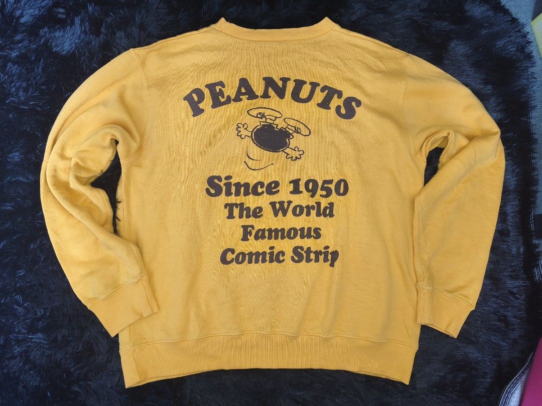 Peanuts Snoopy Boo! Yellow Sweatshirt (Category: Longsleeves) located in Manila. Submitted by gelog2 (Listing ID 1465383232, Image 2). Description: - Authentic Peanuts Snoopy sweatshirt in a vibrant bright yellow color - Front design features a cute Snoopy graphic with 'Boo!' and 'SNOOPY Since 1950' text - Back features the classic Peanuts logo and 'Since 1950 The World Famous Comic Strip' graphic - Comfortable relaxed fit pullover style with lon