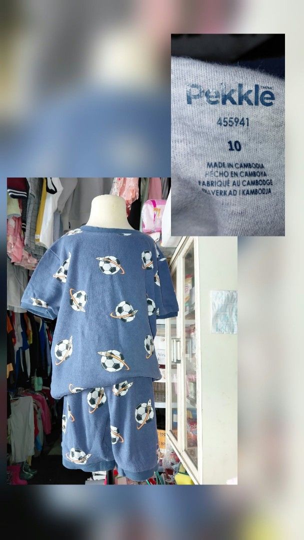 Pekkle Space Soccer Pyjamas Set Size 10 (Category: Babies & Kids Fashion) located in Manila. Submitted by rubymielbona (Listing ID 1465414343, Image 1). Description: - Brand: Pekkle - Set: Blue short-sleeve top and shorts - Design: Fun all-over space soccer ball print - Size: Tag size 10 - Material: Soft cotton, super comfortable for bedtime or lounging - Origin: Made in Cambodia.