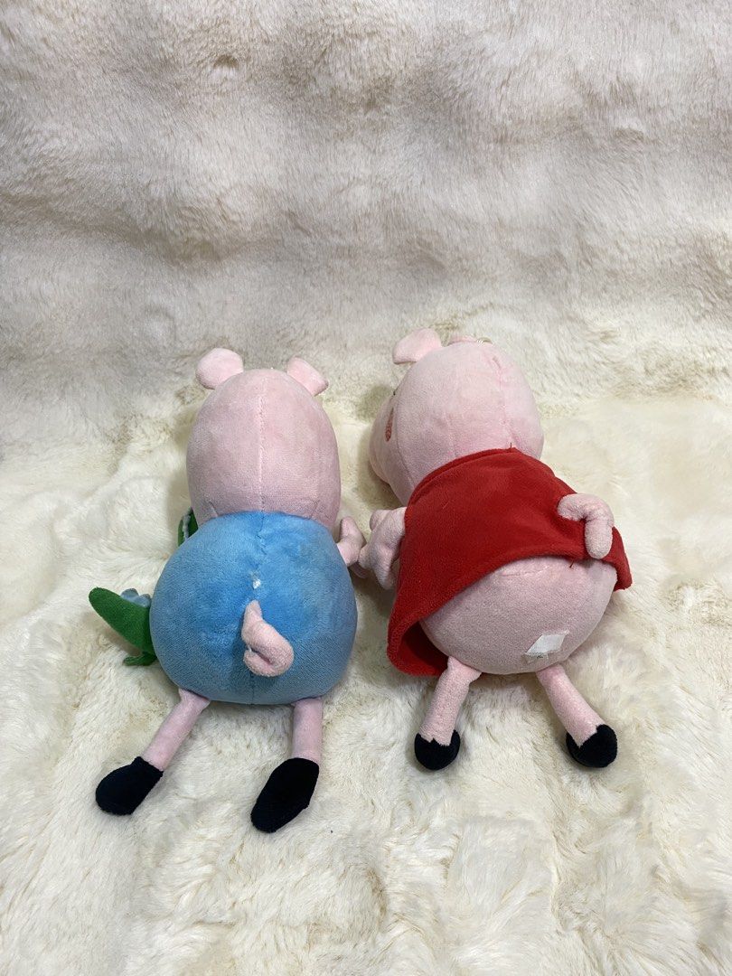 Peppa and George Pig plush set (Category: Plushies & Soft Toys) located in Kalibo. Submitted by ollie_stuffshop (Listing ID 1465392563, Image 3). Description: Peppa: 25cm x 10.5 cm George: 24cm x 10cm Before you send your inquiries: ❗️Last Price is already posted ❗️Manage your expectations, WYSIWYG ❗️May need washing ❗️Dropoff is every Wednesday & Sunday.