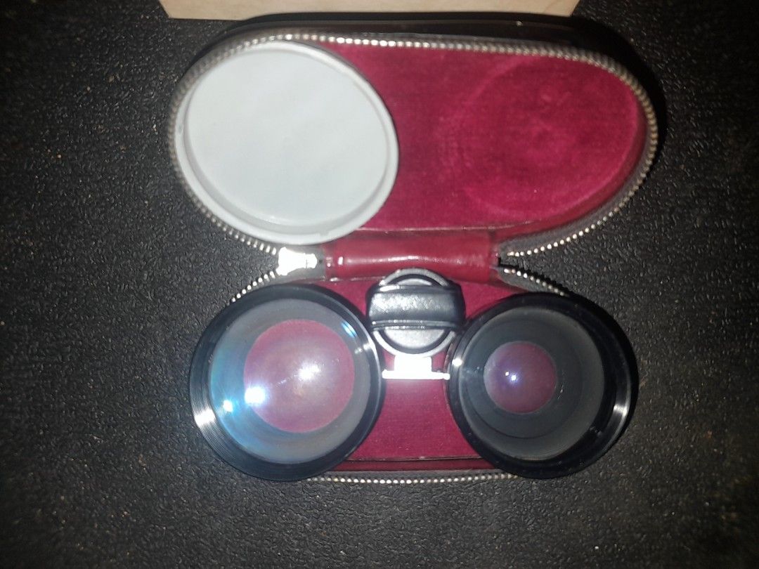 Petri Auxiliary Lens Set with Case and Box (Category: Lens & Kits) located in Puerto Princesa. Submitted by einrans_camshop (Listing ID 1465517007, Image 1). Description: - Authentic vintage Petri auxiliary lens set from Kuribayashi Camera Industry - Includes dual lenses with clean, clear glass elements - Housed in a classic black hard case featuring a red velvet interior - Comes complete with the original striped cardboard box - Ideal collectibl