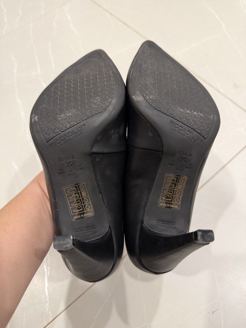 Piccadilly Black Pointed Toe Heels US 6 (Category: Heels) located in Talisay. Submitted by itslucym (Listing ID 1465417831, Image 3). Description: - Brand: Piccadilly - Style: Classic pointed toe stiletto heels with a chic textured finish - Size: Brasil 35 | EUR 37 | US 6 - Comfort: Equipped with padded insoles for all-day wear - Condition: Clean soles with minimal wear - Perfect for: Office wear, interviews, or formal events - Used once during m