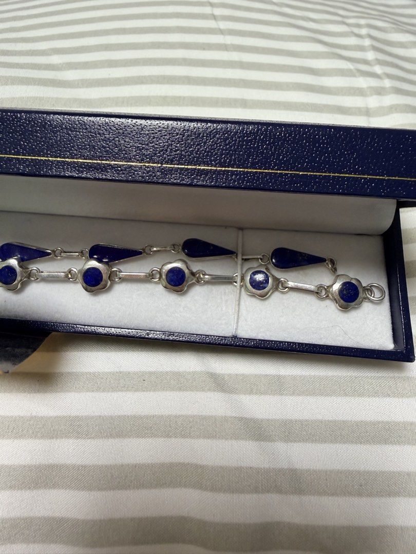 Piedras Australes Authentic Lapis Lazuli Silver Bracelets (Category: Bracelets) located in Quezon City. Submitted by mkl23 (Listing ID 1465415320, Image 1). Description: Bought in Chile (South America) from Piedras Australes, a respected Chilean jewelry and artisan stone shop found only in upscale locations in Santiago, Chile. 💙 Selling as a set of 2 matching bracelets * Guaranteed authentic Chilean Lapis Lazuli * Crafted with high-purity silver