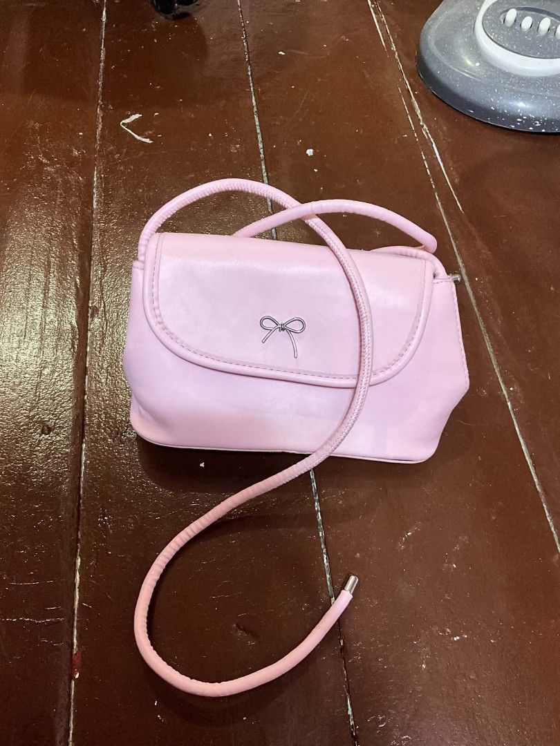 PINK COQUETTE ADJUSTABLE BAG (Category: Shoulder Bags) located in Manila. Submitted by zesshian (Listing ID 1465507605, Image 1). Description: -never been used (nakastock lang) -ribbon pink bag -adjustable strap -cute pink mini bag -shoulder bag kili bag.