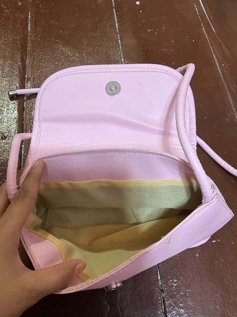 PINK COQUETTE ADJUSTABLE BAG (Category: Shoulder Bags) located in Manila. Submitted by zesshian (Listing ID 1465507605, Image 2). Description: -never been used (nakastock lang) -ribbon pink bag -adjustable strap -cute pink mini bag -shoulder bag kili bag.
