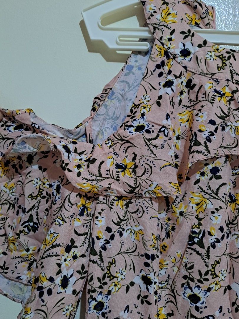 Pink Floral Ruffle Dress (Category: Dresses) located in Manila. Submitted by yselles__ (Listing ID 1465389462, Image 2). Description: - Color/Pattern: Pink with white and yellow floral print - Design: Ruffle sleeves and layered skirt - Comfort: Fully lined with soft, lightweight fabric.