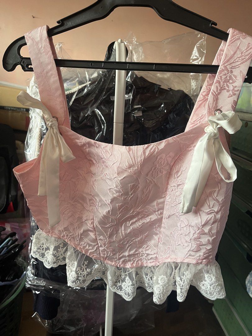 Pink lace ribbon “corset” (Category: Others Tops) located in Manila. Submitted by justshop.ph (Listing ID 1465545565, Image 1). Description: bust 34-35.
