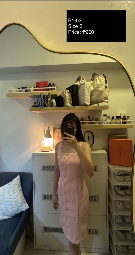 Pink Mini Dress (Category: Dresses) located in Makati City. Submitted by thrift.plethora (Listing ID 1465450939, Image 1). Description: Pink mini dress with buttons Fits Small.