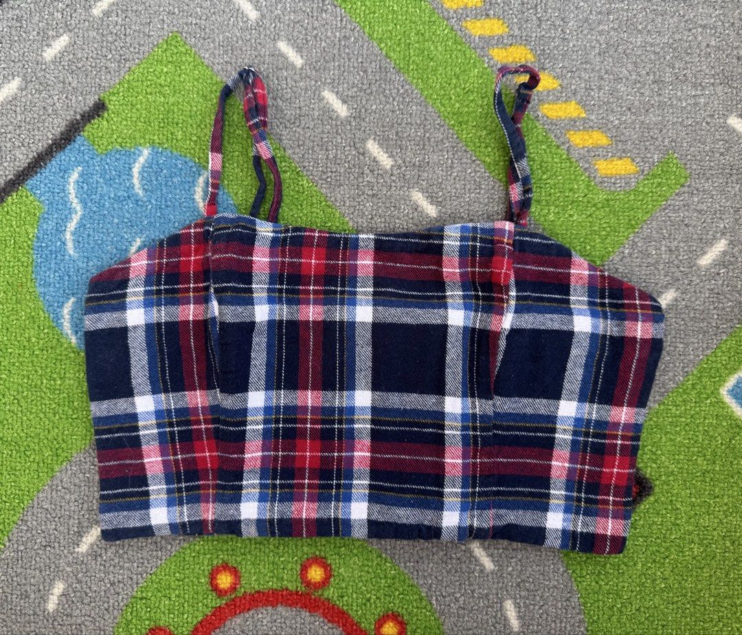 Plaid Cami Crop Top with Smocked Back (Category: Babies & Kids Fashion) located in Rizal. Submitted by preloovved (Listing ID 1465494912, Image 1). Description: Super cute red, blue, and white plaid crop top featuring a square neckline, thin straps, and a stretchy smocked back. Made from soft flannel material, this top is easy to style with high-waisted jeans or skirts for a casual day out. Preloved, 12yo, size XS Meet-up only in GB1 San Mateo, R