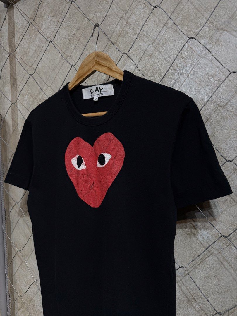 Play CDG Heart Logo Black Tee. (Category: Shirts) located in Manila. Submitted by ardobe.mnl (Listing ID 1465533438, Image 2). Description: Play CDG Heart Logo Black Tee. Size: Small Men’s / Medium-Large Women’s Dimes: 18.5x25.5 Condition: Excellent Flaw: Na damage print nung winashing. 😞 Authentic and good asnew sana Dm for inquiries! 📥.
