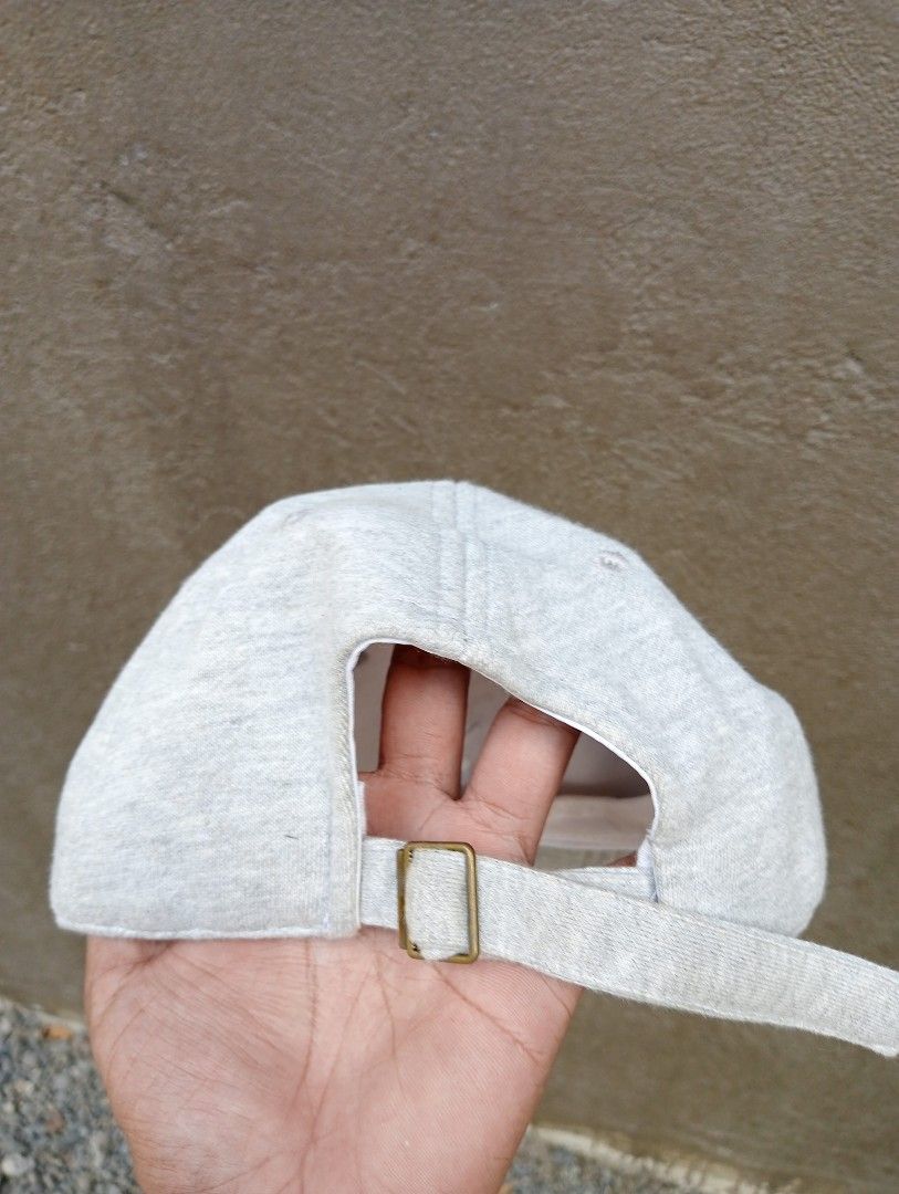 Playboy Grey Embroidered Bunny Logo Baseball Cap (Category: Caps & Hats) located in Manila. Submitted by trifted.lootsph (Listing ID 1465400632, Image 3). Description: - Authentic Playboy baseball cap in versatile grey - Classic white embroidered bunny logo on the front - Adjustable back strap with a durable metal slider buckle - Lightweight and clean fabric blend (50% polyester, 45% cotton, 5% rayon) - Manufactured by GTO Co., Ltd., Made in Chin