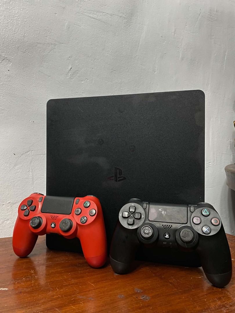 PlayStation 4 Console with Two Controllers (Category: PlayStation) located in Manila. Submitted by chris_14 (Listing ID 1465531342, Image 1). Description: - PlayStation 4 Slim console (Black) - Includes 2 DualShock 4 wireless controllers (1 Red, 1 Black) - Play right away with a friend out of the box - Smooth performance with minor surface marks from normal use - Available for pickup or shipping - purchased in australia - First owner - issue no r