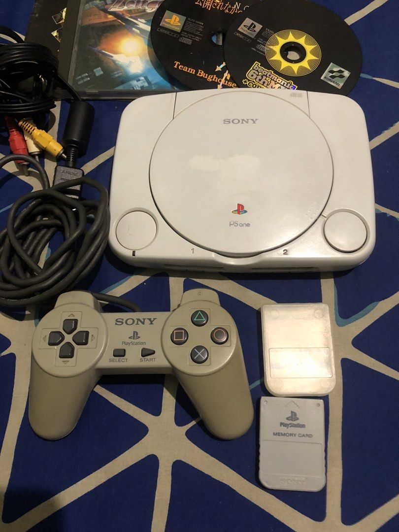 Playstation One - Defective with power (Category: PlayStation) located in Quezon City. Submitted by markgolveo (Listing ID 1465450754, Image 2). Description: Playstation One - Defective with power PS One ntsc Jpn Borrowed an adapter to test with power disc not spinning defective for parts out repairs With authentic av cable 1pc standard ps controller 1pc authentic memory card with case 3 Pcs ps1 black discs jpn No power adapter included.