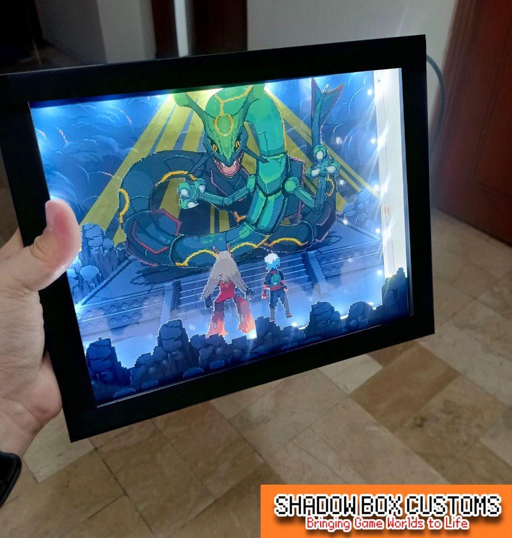 Pokemon Emerald - Rayquaza Video Game Shadow Box (Category: Nintendo) located in Quezon City. Submitted by natzuki10 (Listing ID 1465400554, Image 1). Description: Pokemon Emerald - Rayquaza Video Game Shadow Box Height: 8 inches Width: 10 inches *Handmade Pixel Shadow Boxes *Accepting Customized Designs *Perfect for Gamers & Collectors #videogames #nintendo #roomdecor #collection #gamer #gift .
