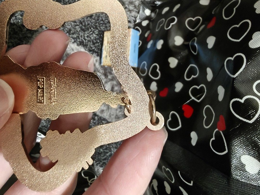Pop mart twinkle twinkle pendant (Category: Designer & Blind Box Toys) located in Pasay City. Submitted by biancabee25 (Listing ID 1465532831, Image 3). Description: complete inclusions unused, bought from Pop mart Hong Kong with small scratch on top part back due to storage.