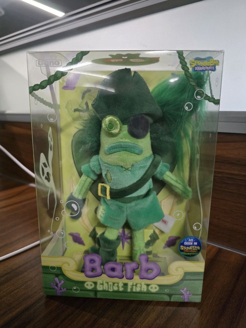 POPMART SpongeBob Barb Ghost Fish Plush Figure (Category: Plushies & Soft Toys) located in Antipolo. Submitted by teej19 (Listing ID 1465430799, Image 1). Description: - Character: Barb Ghost Fish from SpongeBob SquarePants - Condition: Brand new in original collector window box - Design: Green color scheme with pirate hat, eyepatch, and belted outfit - Authenticity: 100% Official Nickelodeon merchandise - Ideal for: SpongeBob fans and plush coll