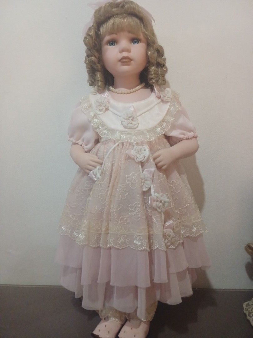 Porcelain Doll (Category: Figurines & Statues) located in Quezon City. Submitted by proteinpancake (Listing ID 1465473345, Image 1). Description: - No box - Imported item - Collectible Toy, not suitable for children below 10yrs.old.