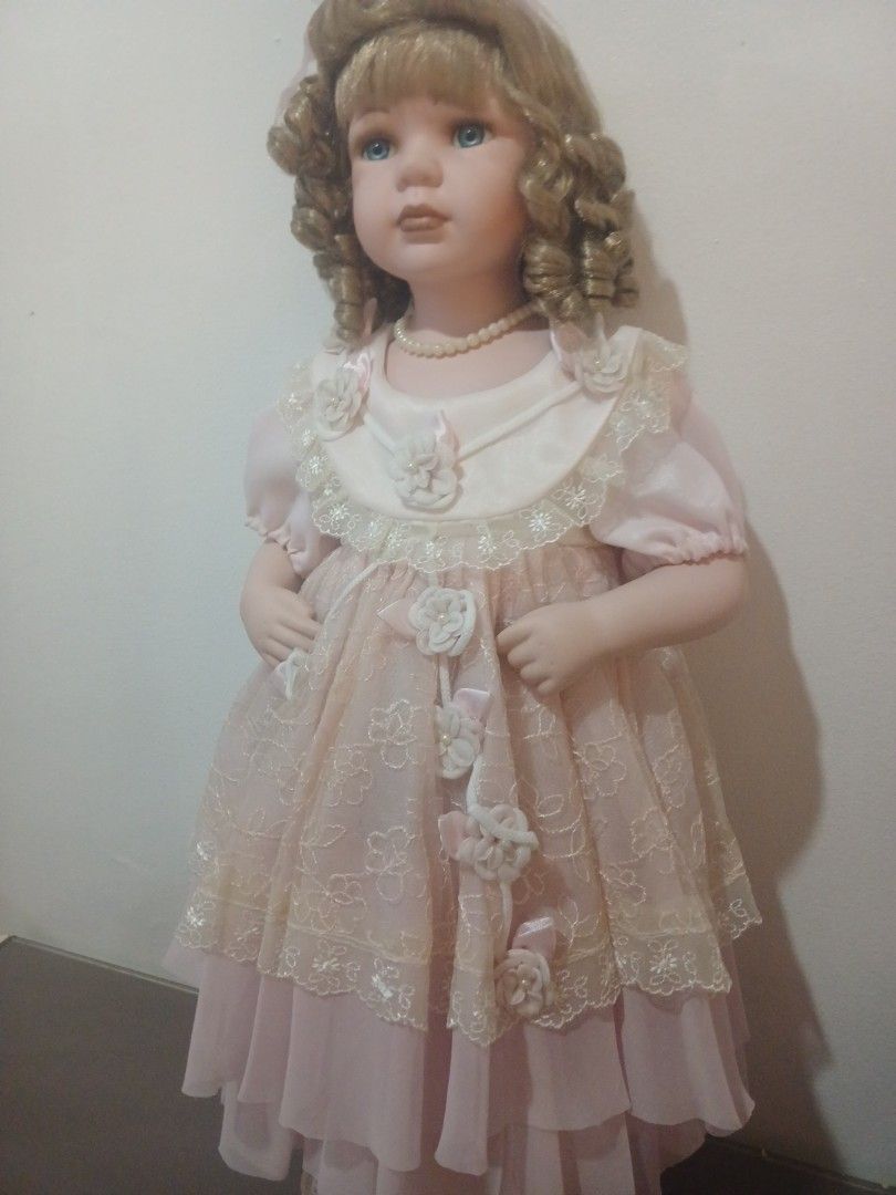 Porcelain Doll (Category: Figurines & Statues) located in Quezon City. Submitted by proteinpancake (Listing ID 1465473345, Image 2). Description: - No box - Imported item - Collectible Toy, not suitable for children below 10yrs.old.
