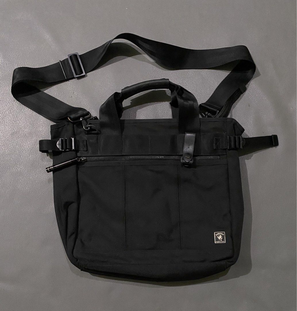 Porter International Black Messenger Bag with Mini Torch (Category: Sling Bags) located in Pozorrubio. Submitted by izaykite2g (Listing ID 1465579042, Image 1). Description: - Authentic Porter International black utility bag - Made from durable, textured nylon material - Includes signature matching branded mini flashlight on the zipper - Multiple functional compartments for easy organization - Adjustable shoulder strap and convenient top carry ha