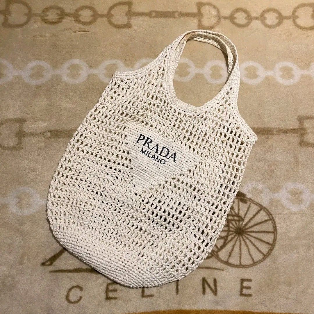 Prada Beach Totebag (Category: Tote Bags) located in Manila. Submitted by bidgeyow20688 (Listing ID 1465499228, Image 1). Description: good condition no issue/needwash size M.