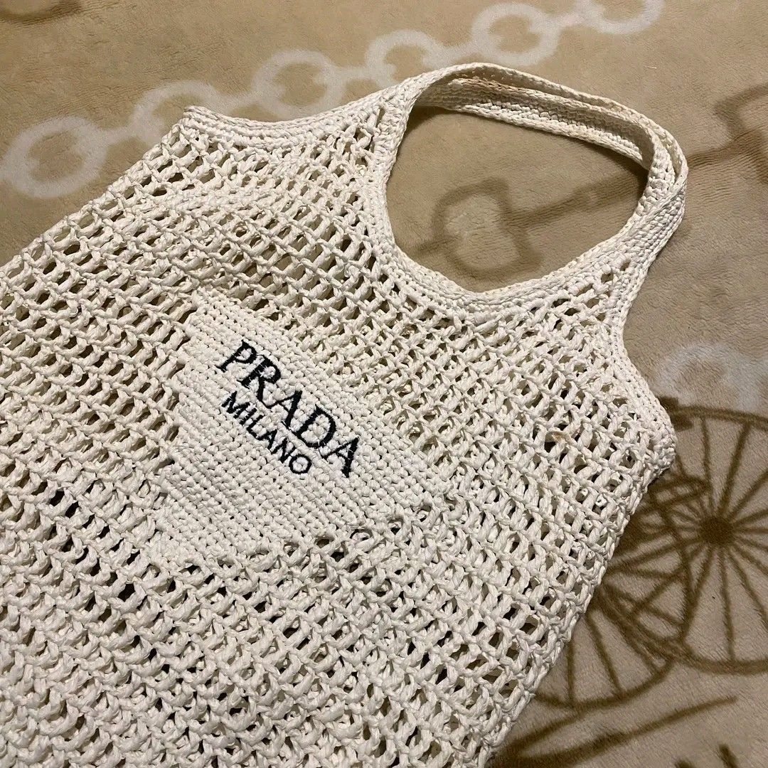 Prada Beach Totebag (Category: Tote Bags) located in Manila. Submitted by bidgeyow20688 (Listing ID 1465499228, Image 2). Description: good condition no issue/needwash size M.
