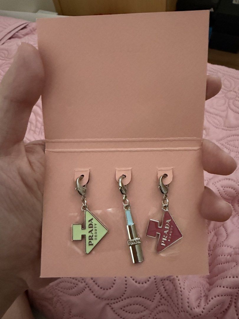 Prada Beauty Puzzle Keychain / Bag Charm Set (Category: Other Accessories) located in Marikina City. Submitted by jlram (Listing ID 1465392365, Image 1). Description: exclusive GWP from Prada flagship store in Korea; comes with cover and paperbag.