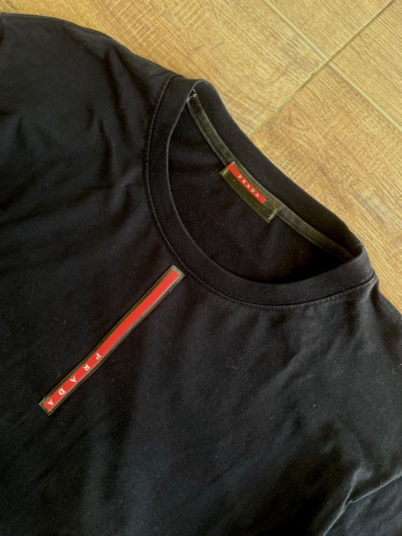 Prada Black Tee (Category: Tshirts & Polo Shirts ) located in Iloilo. Submitted by cuzta.thrift (Listing ID 1465452222, Image 3). Description: Condition:10/10 Color: 10/10 Issue: None.