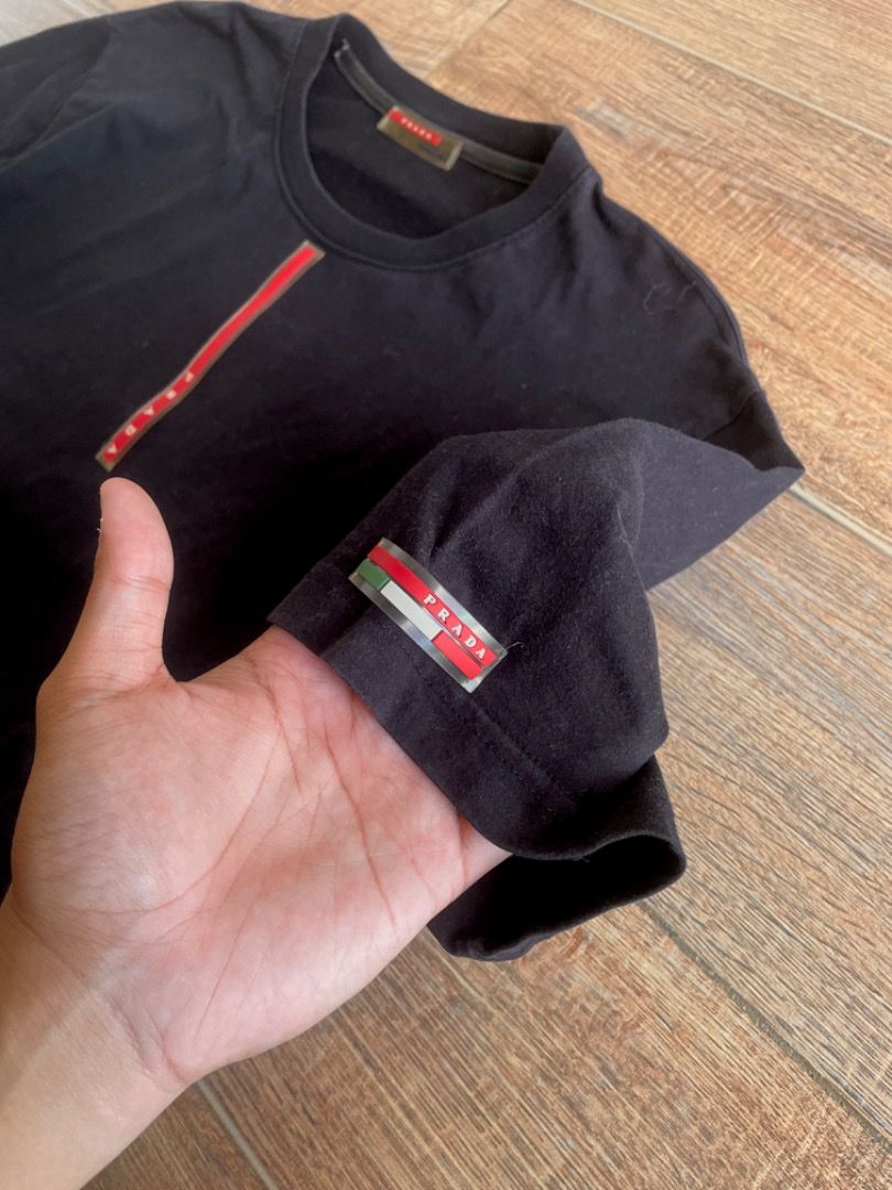 Prada Black Tee (Category: Tshirts & Polo Shirts ) located in Iloilo. Submitted by cuzta.thrift (Listing ID 1465452222, Image 2). Description: Condition:10/10 Color: 10/10 Issue: None.