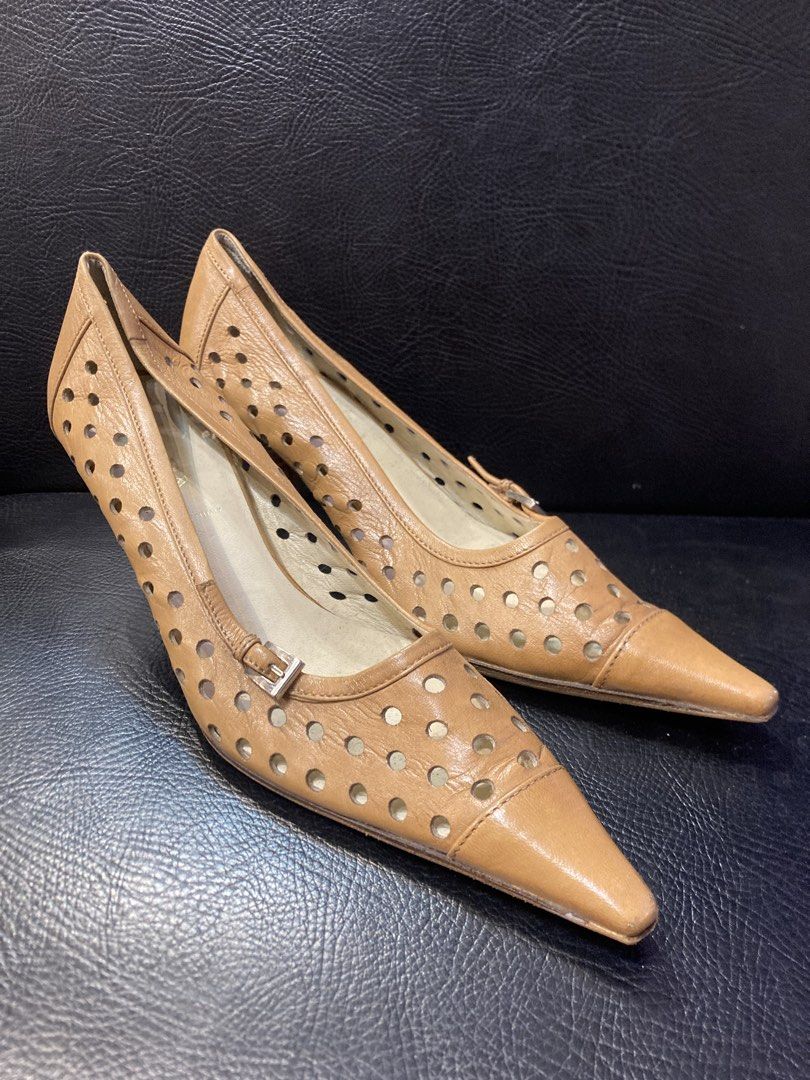 Prada Laser Cut Sandals (Category: Heels) located in Quezon City. Submitted by janisu0303 (Listing ID 1465492262, Image 1). Description: Prada Leather Lasercut Accents Pumps Size 35 8500 php 8/10 condition characterized by their tan pointed-toe design and distinct all-over perforated cut-out detailing with a small side buckle closure Prada Gucci Fendi Chanel Miu Miu balenciaga.