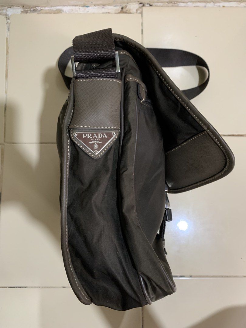 Prada Tessuto Buckle messenger bag (Category: Sling Bags) located in Davao. Submitted by archivecollection (Listing ID 1465429001, Image 3). Description: Prada Tessuto Buckle messenger cross body bag No issue Very Good condition Color : dark brown 13 inches Length 12 inches width Dm for more details .