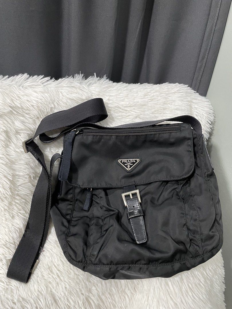 Prada Tessuto Nylon Messenger Bag (Category: Luxury Bags & Wallets) located in Davao. Submitted by lwky_thrift (Listing ID 1465556255, Image 1). Description: Prada Tessuto Nylon Messenger Bag Authentic Good Condition Kindly Check The Attached Photos .