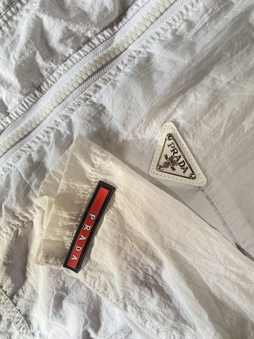 Prada Woven jacket (Category: Coats, Jackets and Outerwear) located in Padada. Submitted by thrift_eknz (Listing ID 1465383407, Image 3). Description: EXCELLENT CONDITION NO ISSUE SIZE M womens WOVEN FABRIC .