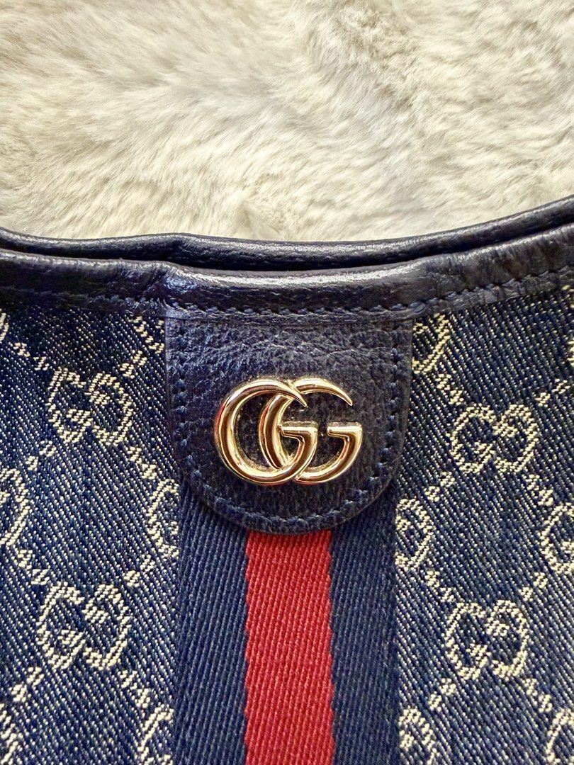 Preloved Gucci Large GG Denim Bag with Strap (Category: Shoulder Bags) located in Manila. Submitted by mrsmdxbseller (Listing ID 1465393539, Image 3). Description: .