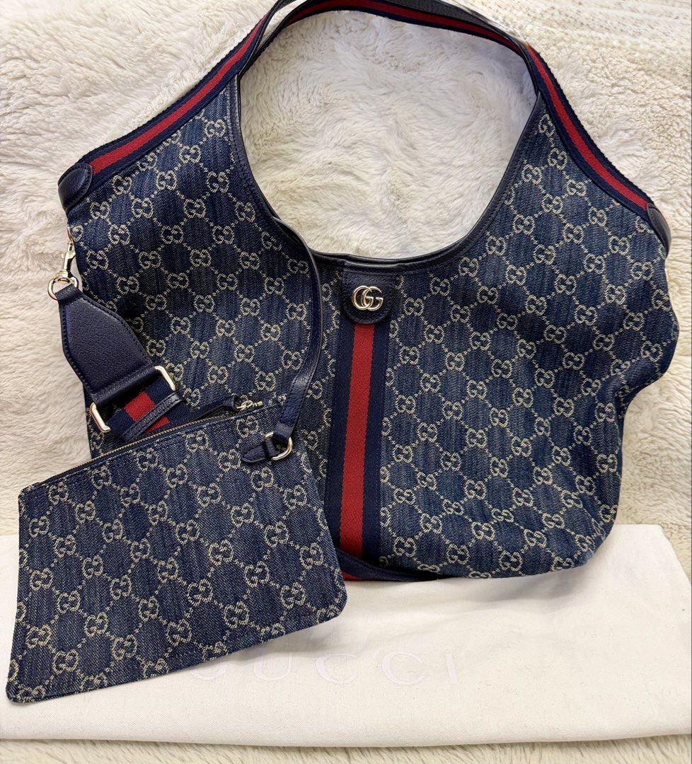 Preloved Gucci Large GG Denim Bag with Strap (Category: Shoulder Bags) located in Manila. Submitted by mrsmdxbseller (Listing ID 1465393539, Image 1). Description: .