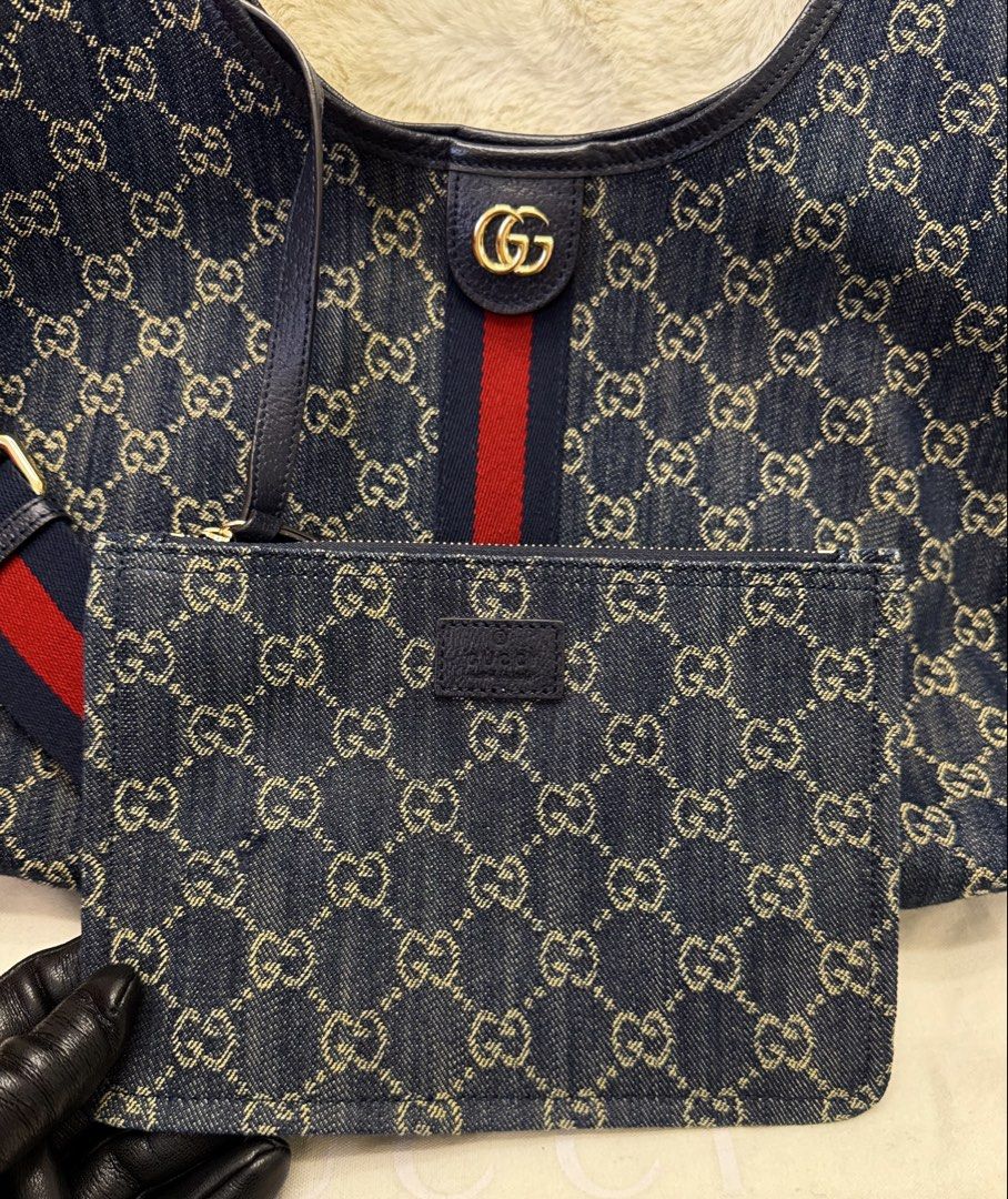 Preloved Gucci Large GG Denim Bag with Strap (Category: Shoulder Bags) located in Manila. Submitted by mrsmdxbseller (Listing ID 1465393539, Image 2). Description: .