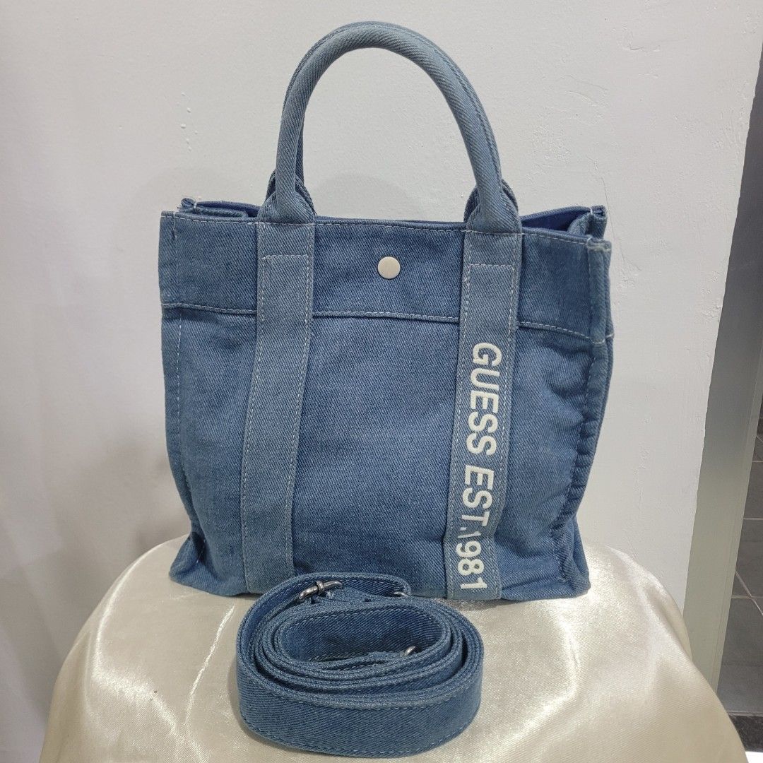 PRE-LOVED GUESS TOTE (Category: Tote Bags) located in Dasmarinas. Submitted by bome1 (Listing ID 1465411390, Image 1). Description: Good Condition.