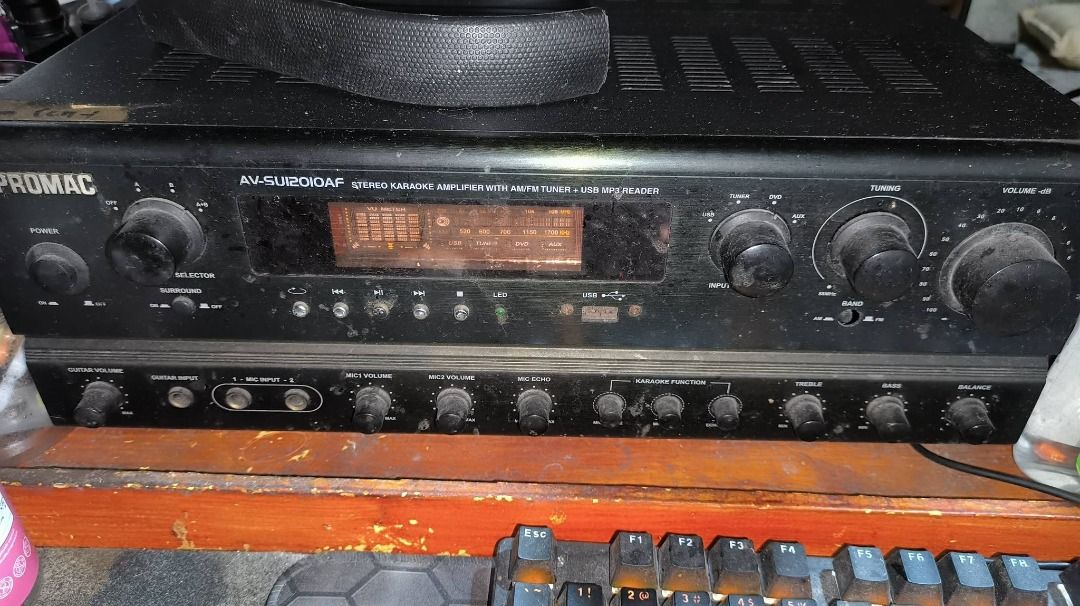 Promac AV-SU12010AF Stereo Karaoke Amplifier (Category: Soundbars, Speakers & Amplifiers) located in Pasig City. Submitted by daddymike (Listing ID 1465568850, Image 1). Description: - Model: Promac AV-SU12010AF Stereo Karaoke Amplifier - Built-in AM/FM tuner and USB MP3 player - Multiple audio inputs and speaker terminal outputs - Dual microphone jacks for karaoke sessions - Front panel display screen with playback control buttons - Rotary knobs