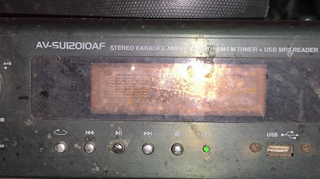 Promac AV-SU12010AF Stereo Karaoke Amplifier (Category: Soundbars, Speakers & Amplifiers) located in Pasig City. Submitted by daddymike (Listing ID 1465568850, Image 2). Description: - Model: Promac AV-SU12010AF Stereo Karaoke Amplifier - Built-in AM/FM tuner and USB MP3 player - Multiple audio inputs and speaker terminal outputs - Dual microphone jacks for karaoke sessions - Front panel display screen with playback control buttons - Rotary knobs