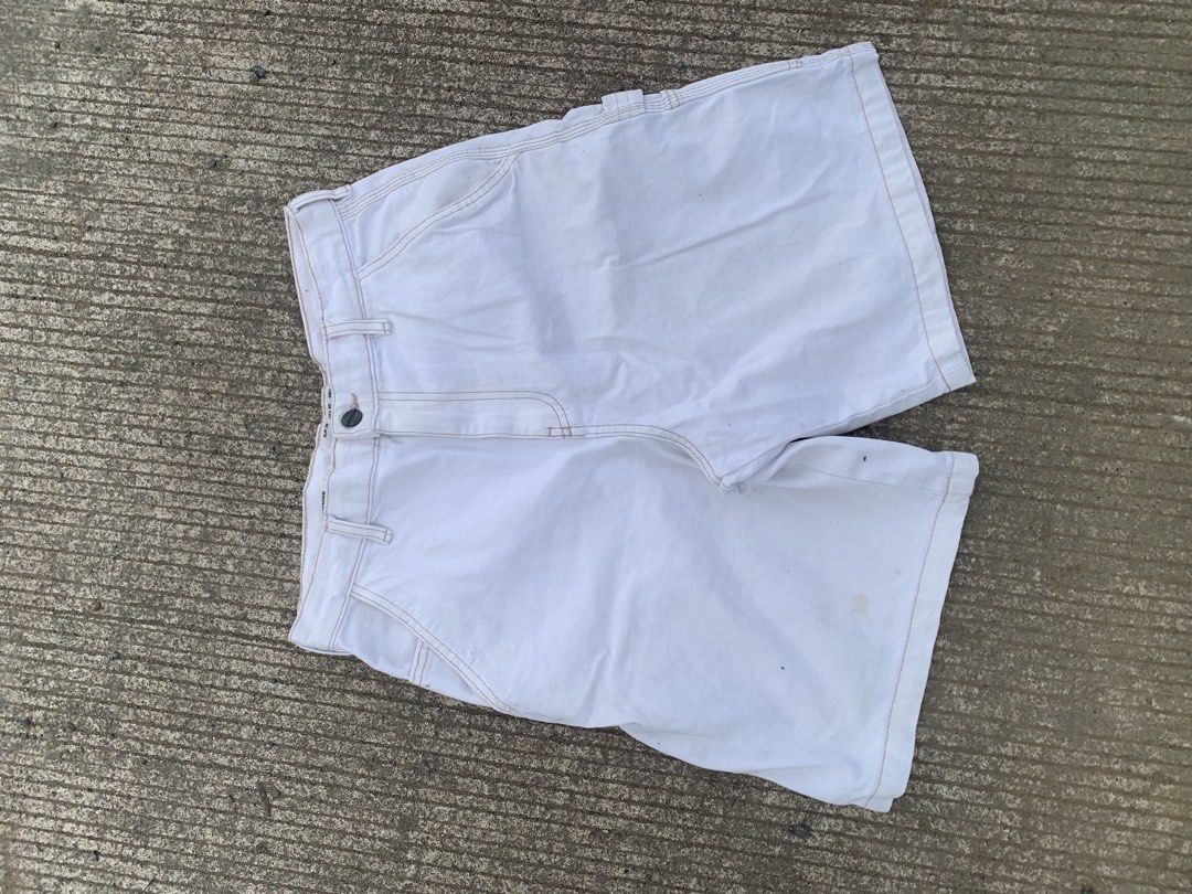 Pull & Bear White Denim Cargo Shorts (Category: Shorts) located in Iloilo. Submitted by johnpullan30303 (Listing ID 1465494109, Image 3). Description: - Brand: Pull & Bear - Color: White - Material: Sturdy denim - Features: Multiple side utility pockets, back pockets with contrast stitching, button fly closure - Style: Casual streetwear staple - Condition: Good, with some minor stains on the lower front leg.